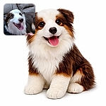 A gleeful doggo lounges on a leather couch, tongue flopping out and eyes sparkling like it just heard the word 'treat' — a human hand with a tattoo offers support while blinds form a cozy background.