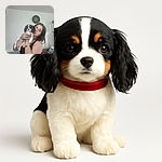 A young woman holding a small, adorable black and white puppy close to her face in a casual indoor setting. The background shows a wall clock and some household items, adding a cozy, lived-in vibe to the photo.