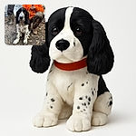 A charming black and white spotted dog sits attentively on a gravel path surrounded by fallen leaves, with two people nearby dressed in outdoor gear, one wearing a bright orange jacket and camo pants, creating a rustic and cozy outdoor vibe.