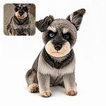 A scruffy little dog sits proudly on the carpet, staring into the camera with one bright eye and one mysterious dark eye like a tiny, whiskered wizard waiting for treats.