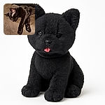 A black cat is peacefully sleeping on a brown couch with its tiny pink tongue sticking out, showing off its relaxed and adorable nap vibes.