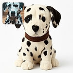 A Dalmatian dog with distinctive black spots and a serious expression sits indoors on a wooden floor, wearing a collar and looking directly at the camera as if waiting for a treat or a command.
