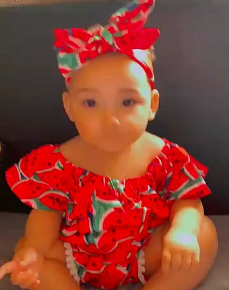 Laurel joined the competition — help win amazing prizes! arm, baby, baby_toddler_clothing, cap, costume_hat, dress, ear, eye, face, finger, hand, happy, head, headgear, headpiece, human_body, lip, neck, person, pink