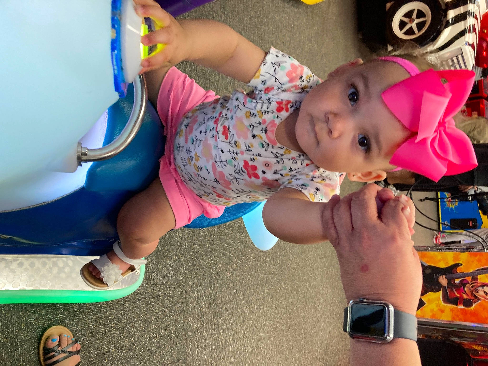 Laurel joined the competition — help win amazing prizes! baby, baby_toddler_clothing, child, facial_expression, fun, happy, headwear, knee, leisure, mouth, person, pink, recreation, sandal, shorts, sneakers, textile, thigh, tire, toddler