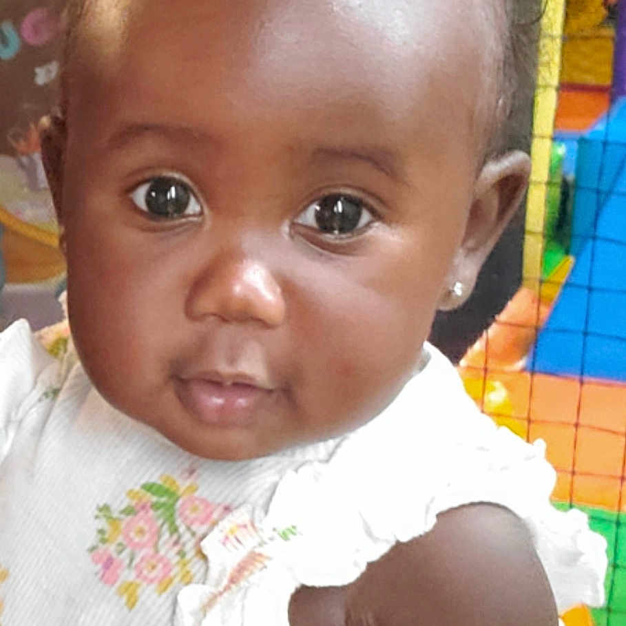 Ayvah joined the competition — help win amazing prizes! adorable, arm, baby, child, clothing, cute, eyes, face, floral_dress, girl, head, indoor, infant, person, pink_bow, play_area, portrait, skin, smiling, young