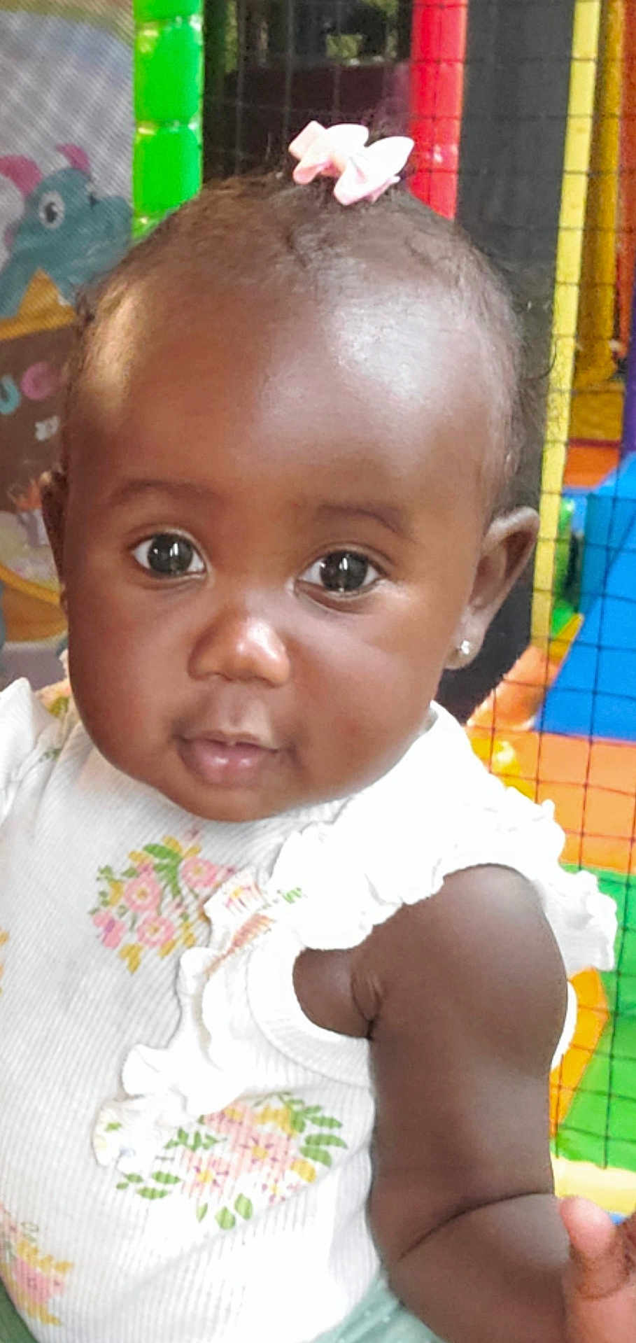 Ayvah joined the competition — help win amazing prizes! adorable, arm, baby, child, clothing, cute, eyes, face, floral_dress, girl, head, indoor, infant, person, pink_bow, play_area, portrait, skin, smiling, young