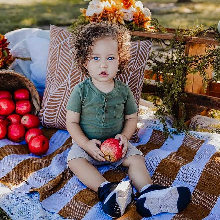 Nolan joined the competition — help win amazing prizes! baby, blanket, blonde, brownhair, clothing, curlyhair, face, fun, hair, head, leisureactivities, people, person, picnic, picnicbasket, sitting, sleeve