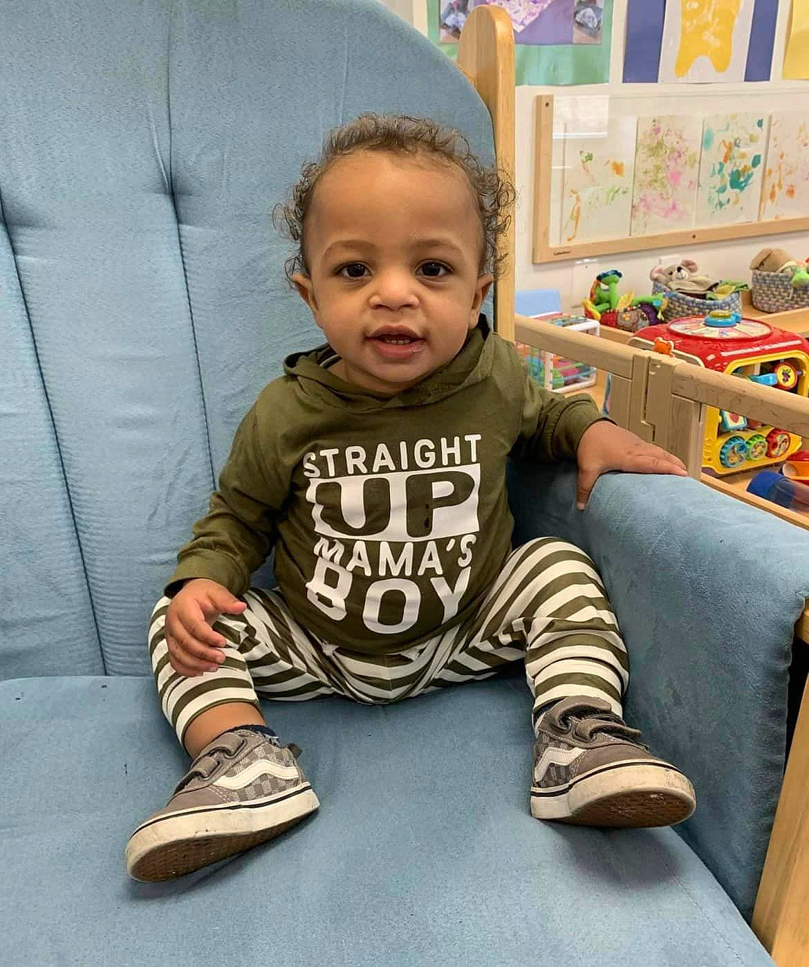 Chance joined the competition — help win amazing prizes! baby, baby_toddler_clothing, chair, child, comfort, flooring, foot, happy, human_leg, knee, leg, pattern, person, sitting, sleeve, smile, sock, sportswear, t_shirt, toddler