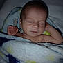 Frankie is registered to the contest to win money with this photo: baby, blanket, sleeping, newborn, infant, child, peaceful, resting, soft, cute, wrapped, cozy, indoors, portrait, skin, hand, closed_eyes, young, lying_down, comfort