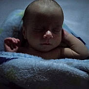 Frankie joined the competition — help win amazing prizes! baby, sleeping, blanket, infant, peaceful, soft, wrapped, arm, resting, head, closeup, face, newborn, cute, indoors, quiet, calm, child, nap, relax