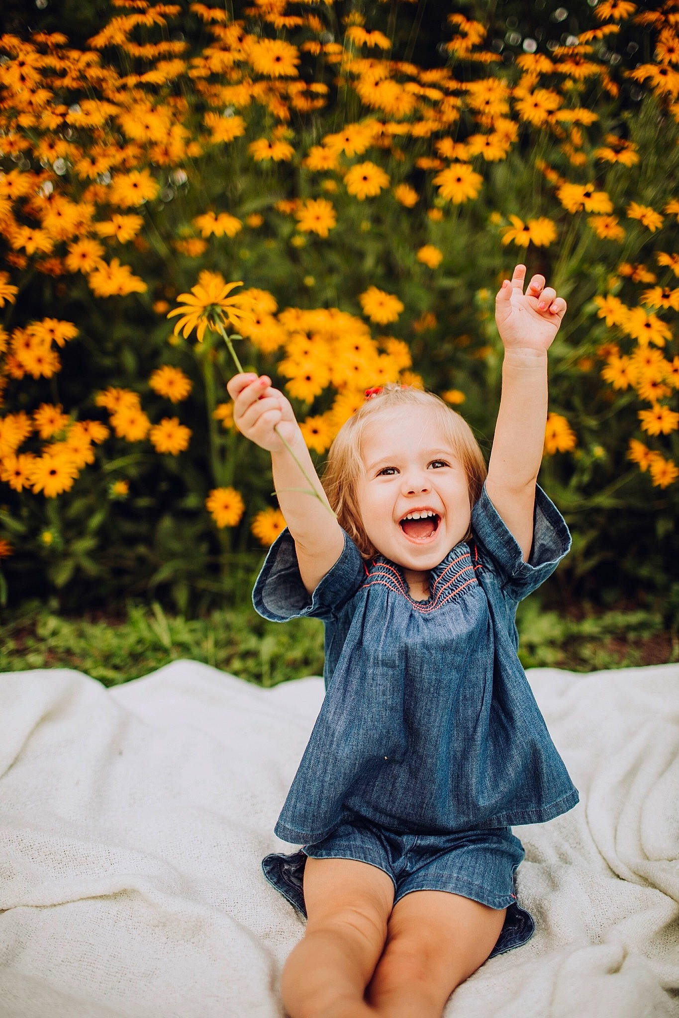 Blaire is registered to the contest to win money with this photo: autumn, beauty, child, child_model, facial_expression, finger, fun, happy, joy, laugh, leaf, people, people_in_nature, person, photograph, photography, plant, sitting, smile, toddler