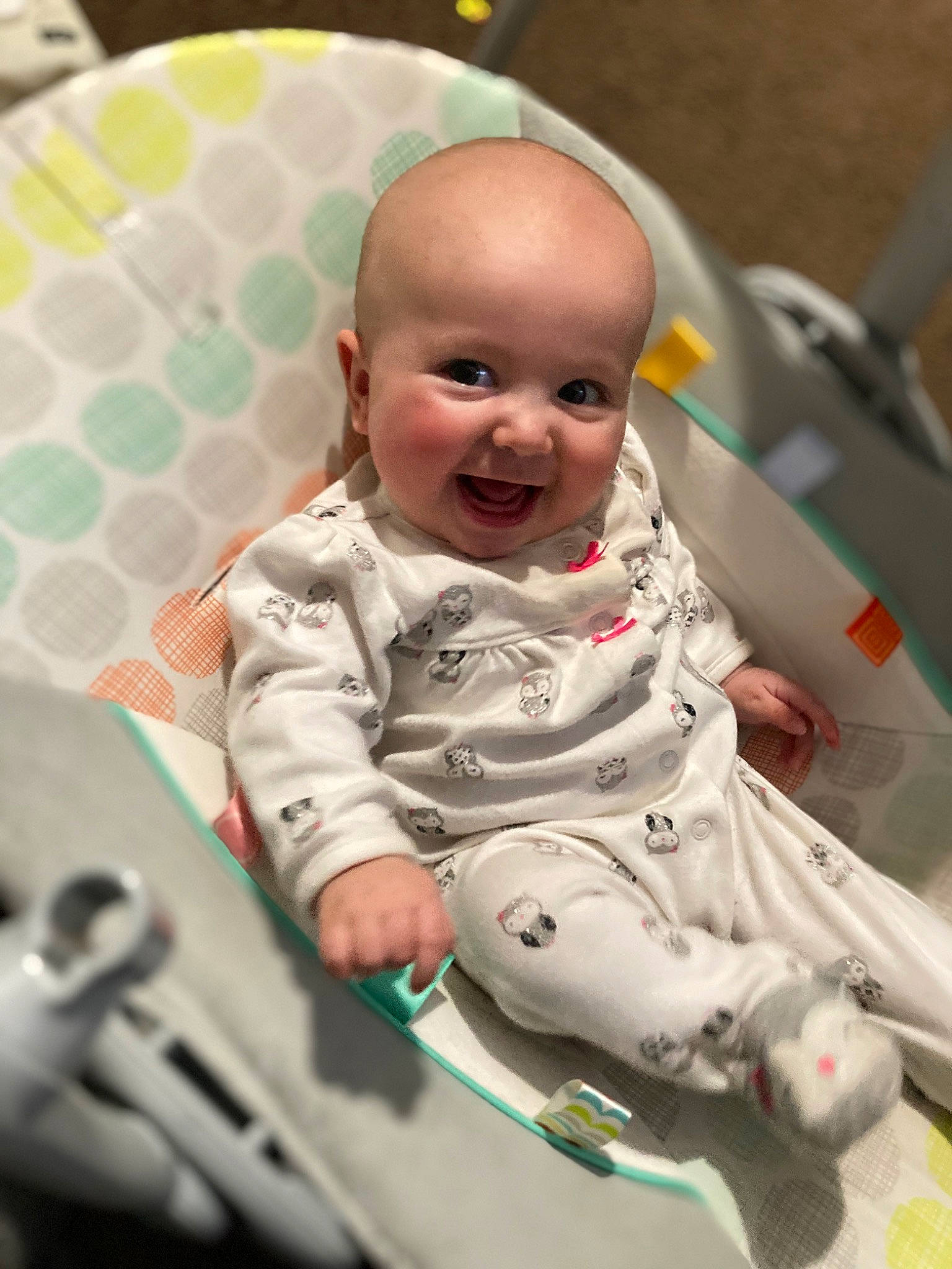 Olivia is registered to the contest to win money with this photo: baby, baby_laughing, baby_products, baby_safety, baby_toddler_clothing, carmine, cheek, child, comfort, eye, flooring, fun, happy, person, product, room, sitting, skin, sleeve, smile