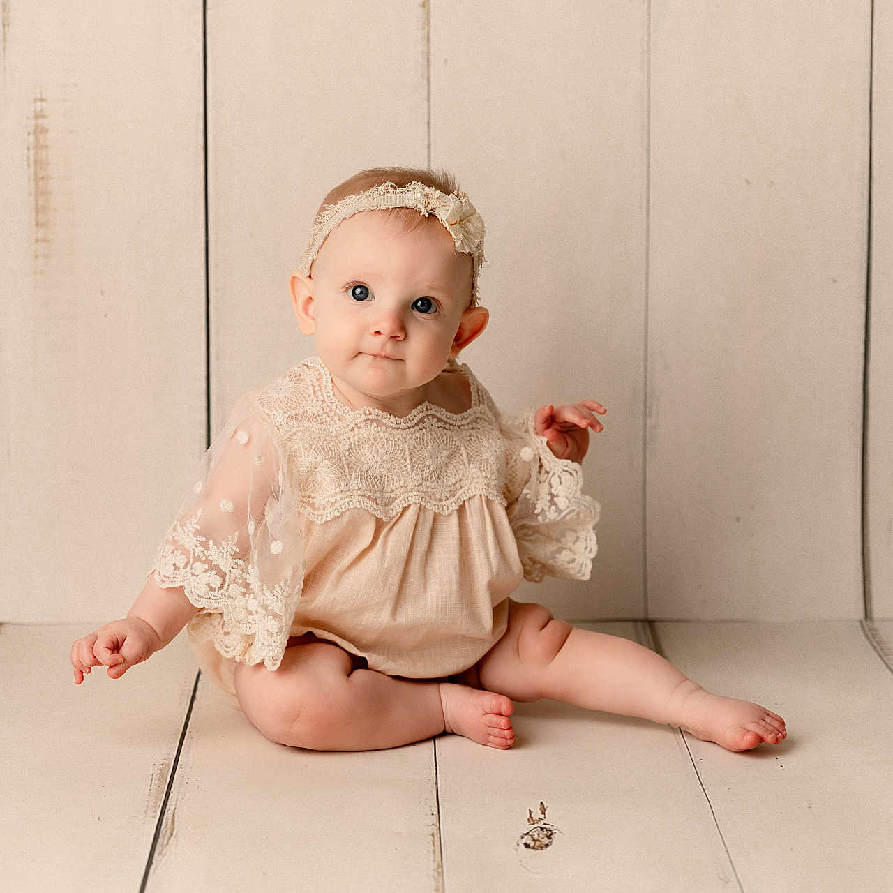 Joelle joined the competition — help win amazing prizes! baby, barefoot, bodypart, bonnet, clothing, crawling, dress, face, finger, formalwear, hand, hardwood, head, newborn, person, photography, portrait, sitting, toy, wood