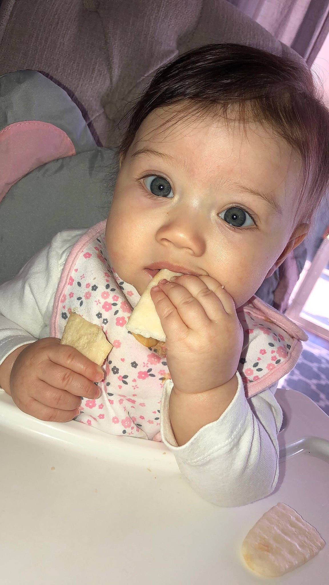 Aviana is registered to the contest to win money with this photo: baby, cheek, child, eating, eye, face, finger, food, lip, mouth, nose, person, pink, skin, thumb, toddler