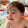 Isaac is registered to the contest to win money with this photo: toddler, child, baby, smiling, indoor, play_mat, toy, living_room, couch, blanket, happy, cute, skin, hair, face, person, floor, colorful, play, infant