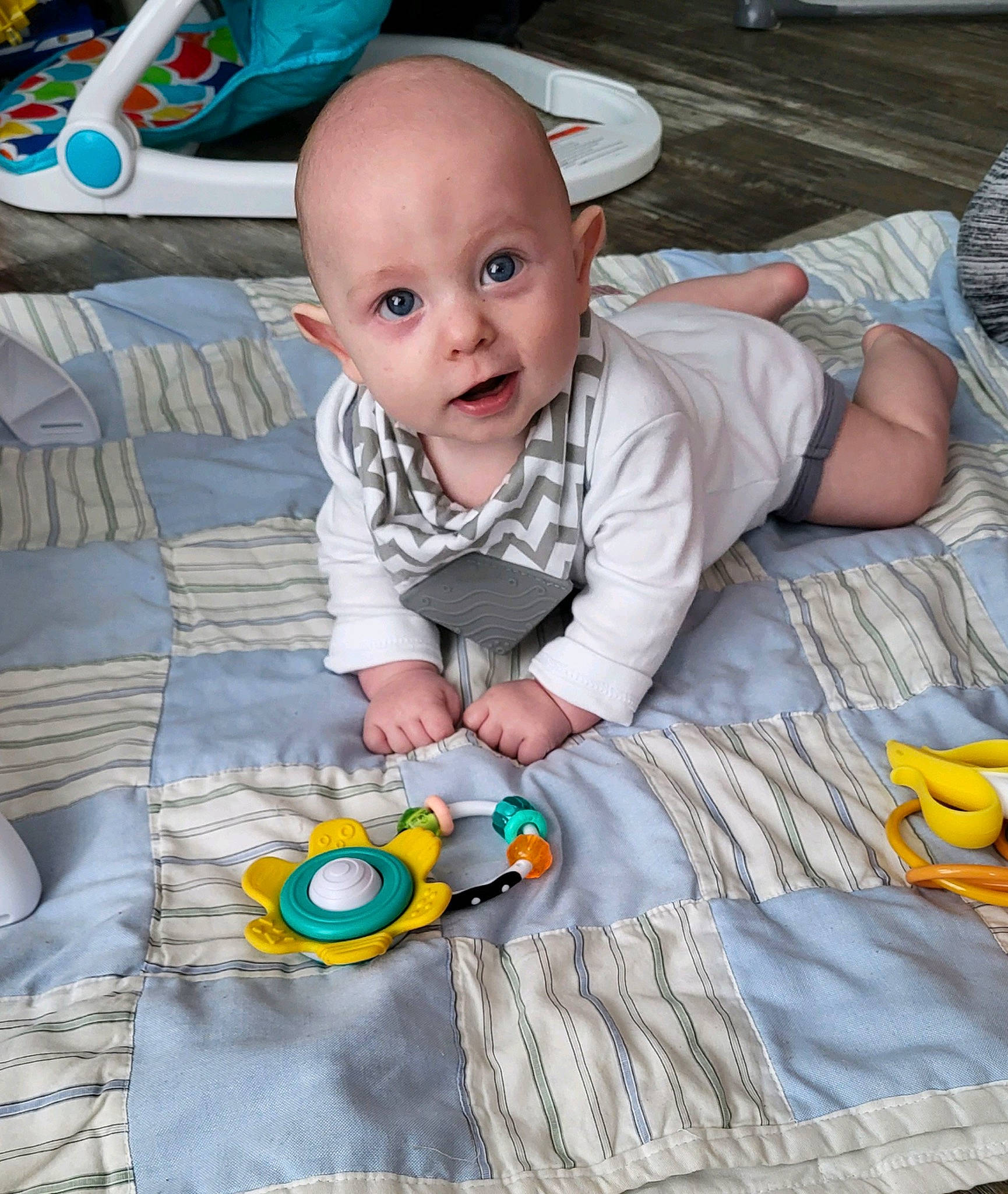 Kameron joined the competition — help win amazing prizes! baby, baby_products, baby_toddler_clothing, baby_toys, child, comfort, crawling, flooring, fun, grass, happy, leisure, linens, pattern, person, play, room, sitting, toddler, tummy_time