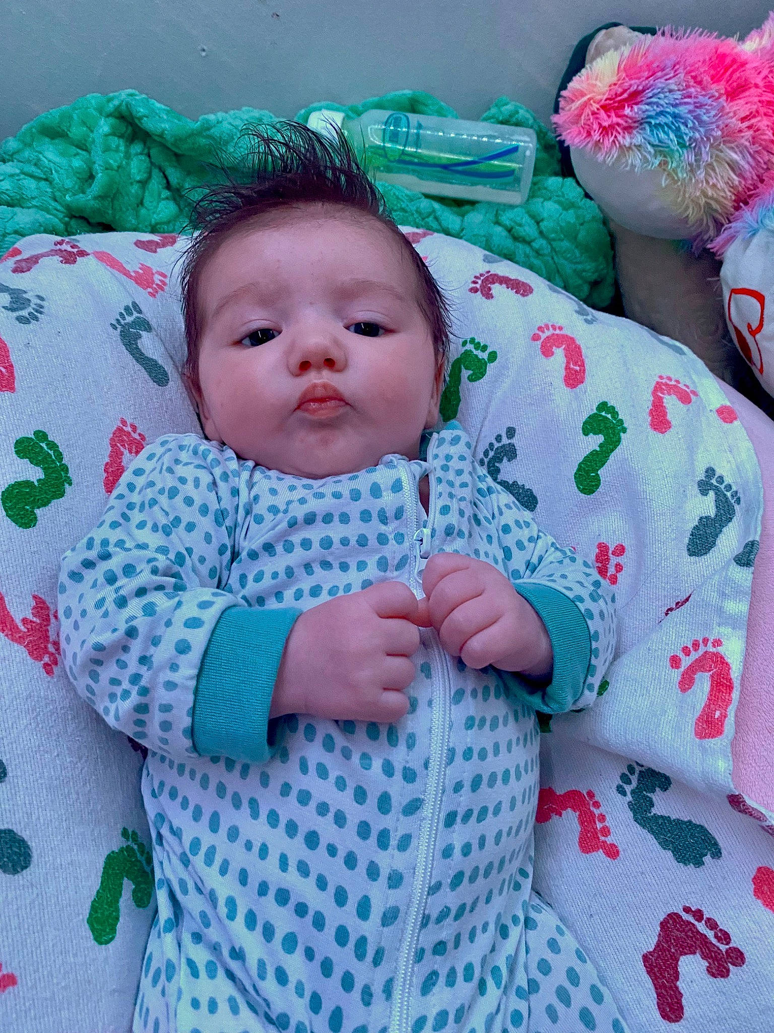 Jaxton is registered to the contest to win money with this photo: baby, baby_products, baby_sleeping, baby_toddler_clothing, cheek, child, comfort, grass, happy, linens, pattern, person, pink, product, room, sitting, skin, sleeve, textile, toddler