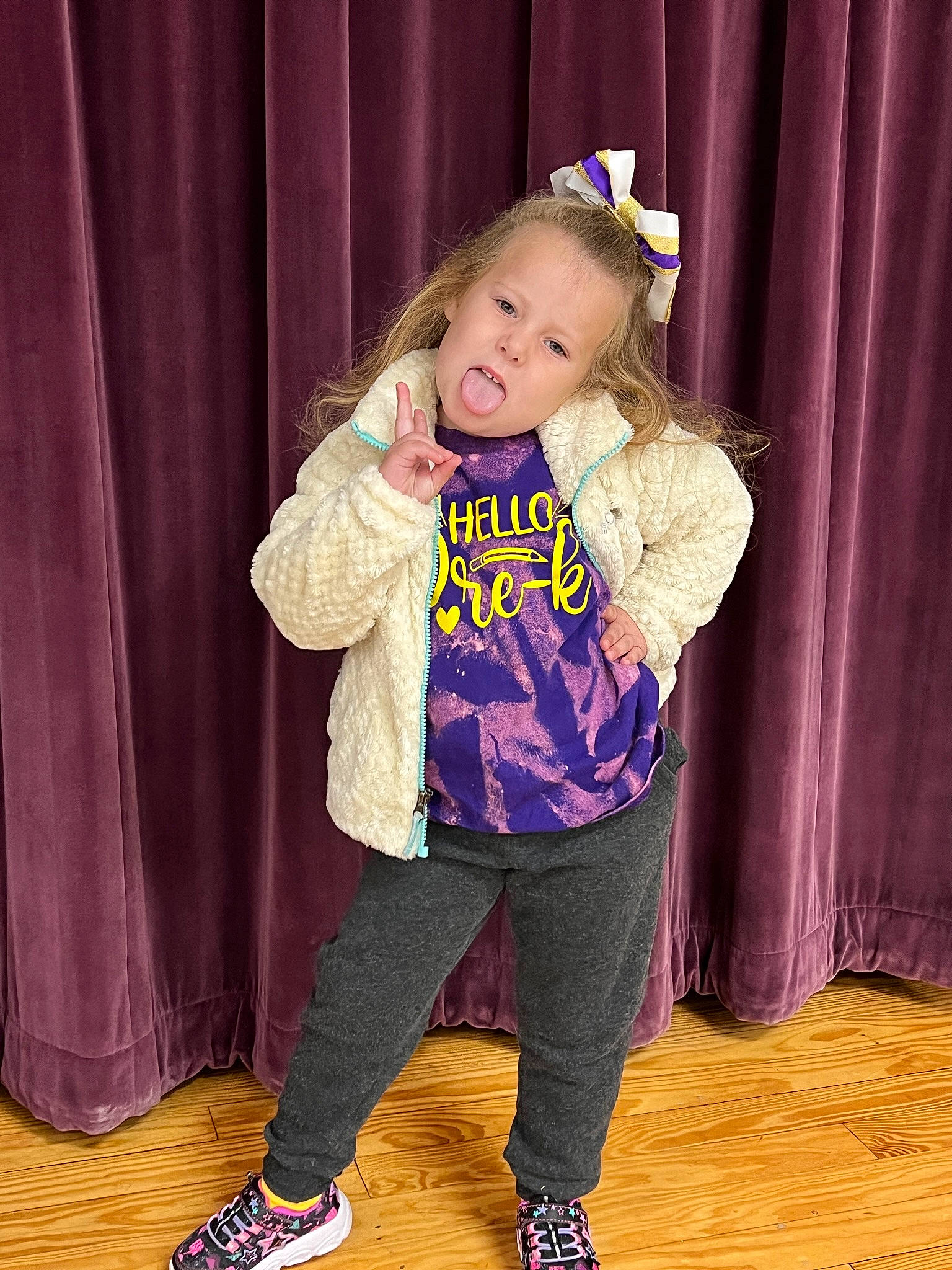 Madeline joined the competition — help win amazing prizes! baby_toddler_clothing, boot, child, costume, costume_hat, curtain, entertainment, event, fashion_accessory, fashion_design, flooring, fun, happy, hardwood, headgear, magenta, person, pink, purple, sleeve