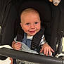 Albie joined the competition — help win amazing prizes! baby, baby_clothes, blanket, blue_eyes, child, closeup, clothing, cute, fabric, hand, happy, indoor, infant, person, plush_toy, portrait, seatbelt, smiling, stroller, toy