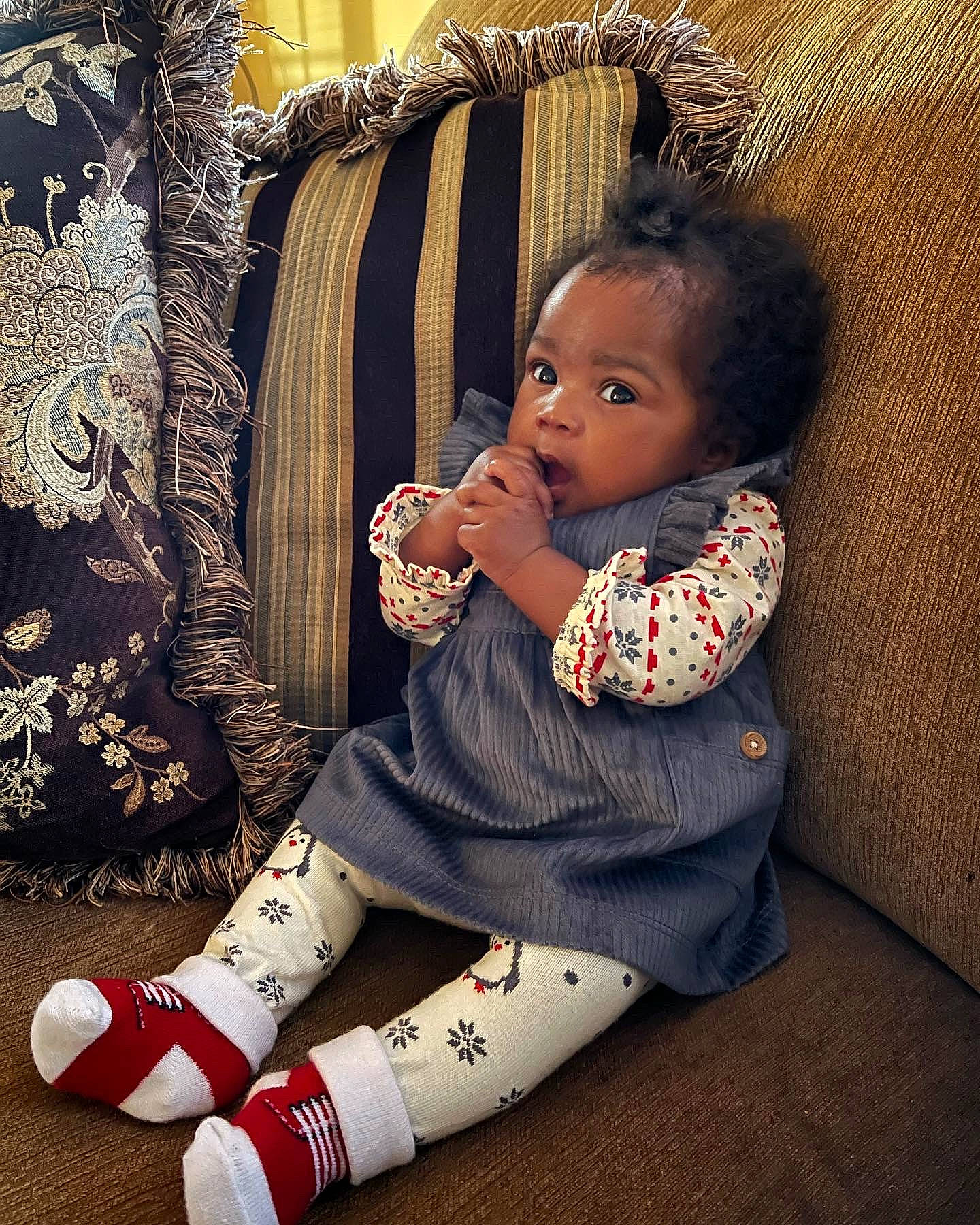 Adrianna is registered to the contest to win money with this photo: baby, baby_toddler_clothing, black, carmine, flash_photography, flooring, foot, happy, human_leg, knee, lap, pattern, person, sitting, sleeve, sock, textile, thigh, toddler, tradition