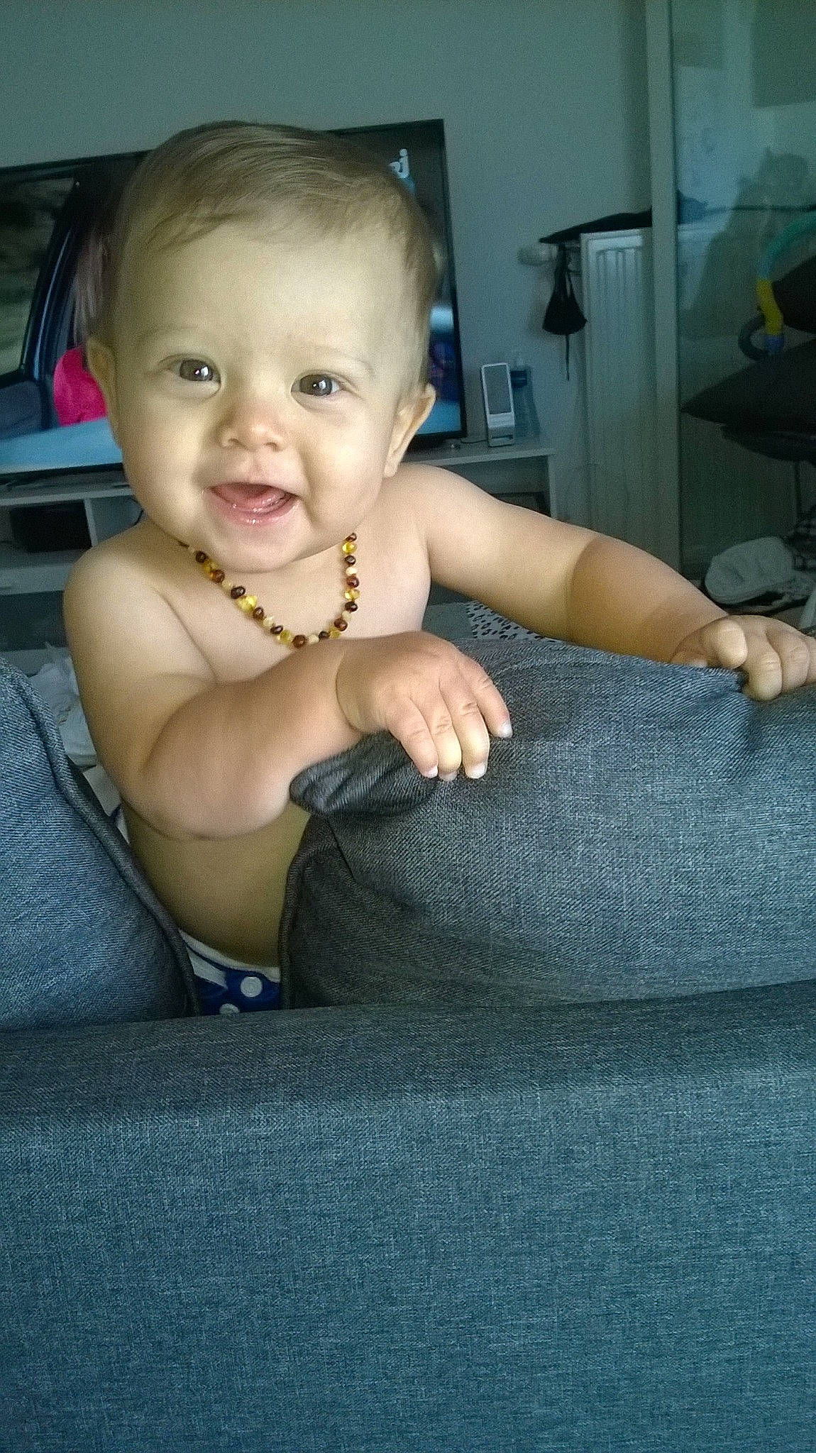 Ayden participe au concours pour gagner de l'argent avec cette photo : baby, baby_toddler_clothing, cheek, comfort, eye, finger, flash_photography, flooring, hand, happy, head, human_leg, lip, nose, person, shoulder, skin, smile, thigh, toddler