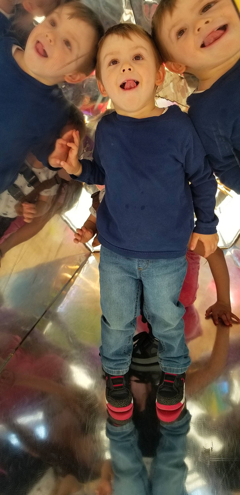 Brian is registered to the contest to win money with this photo: cheek, child, cool, daughter, footwear, fun, gesture, human, jeans, leg, person, shoe, smile, t_shirt, toddler