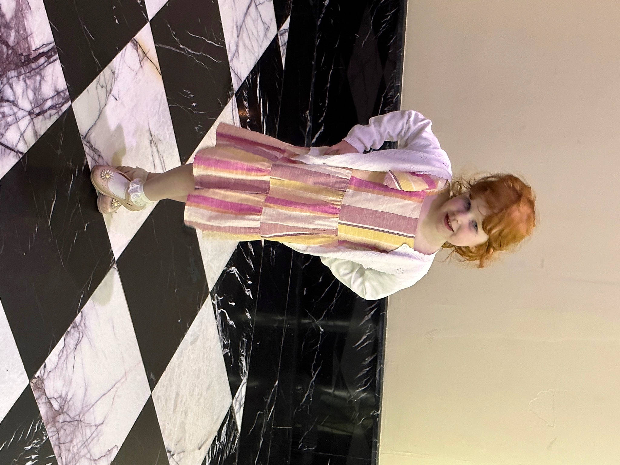 Ivy is registered to the contest to win money with this photo: day_dress, event, fashion_design, formal_wear, fun, joy, magenta, pattern, performance, person, room, sleeve, tints_and_shades, triangle, visual_arts, waist