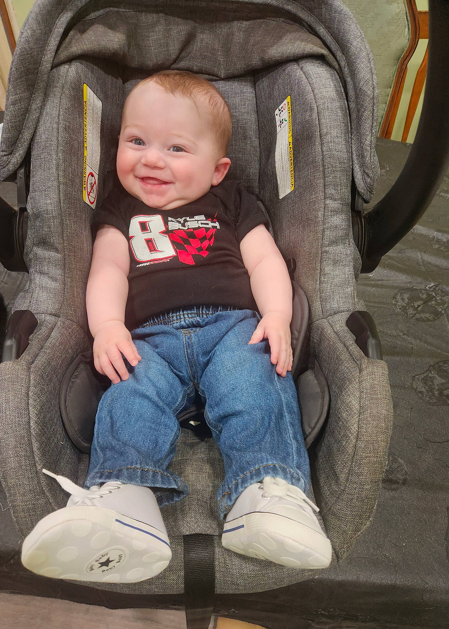 Nathaniel is registered to the contest to win money with this photo: baby, baby_carriage, baby_products, baby_toddler_clothing, chair, cheek, comfort, denim, eye, jeans, joy, lap, leg, organ, people, person, sitting, skin, sleeve, smile