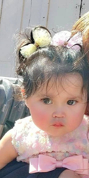 Irie is registered to the contest to win money with this photo: beauty, black_hair, cheek, child, chin, doll, dress, eye, eyebrow, eyelash, fawn, hairstyle, head, headgear, headpiece, iris, person, pink, skin, toy