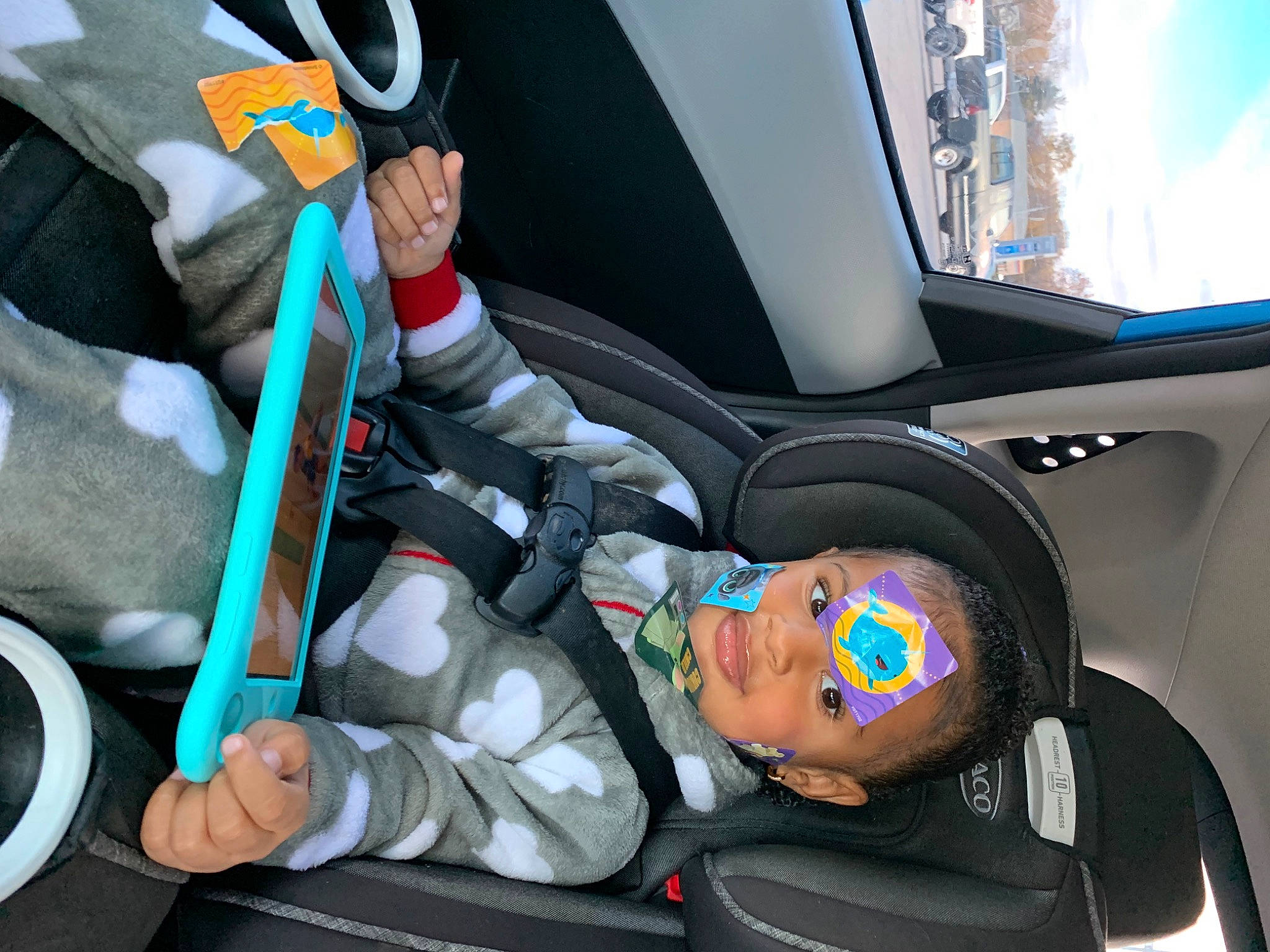 Karsyn is registered to the contest to win money with this photo: auto_part, automotive_design, automotive_exterior, baby, baby_in_car_seat, car, car_seat, car_seat_cover, comfort, head_restraint, mode_of_transport, motor_vehicle, person, seat_belt, service, steering_part, steering_wheel, toddler, vehicle, vehicle_door