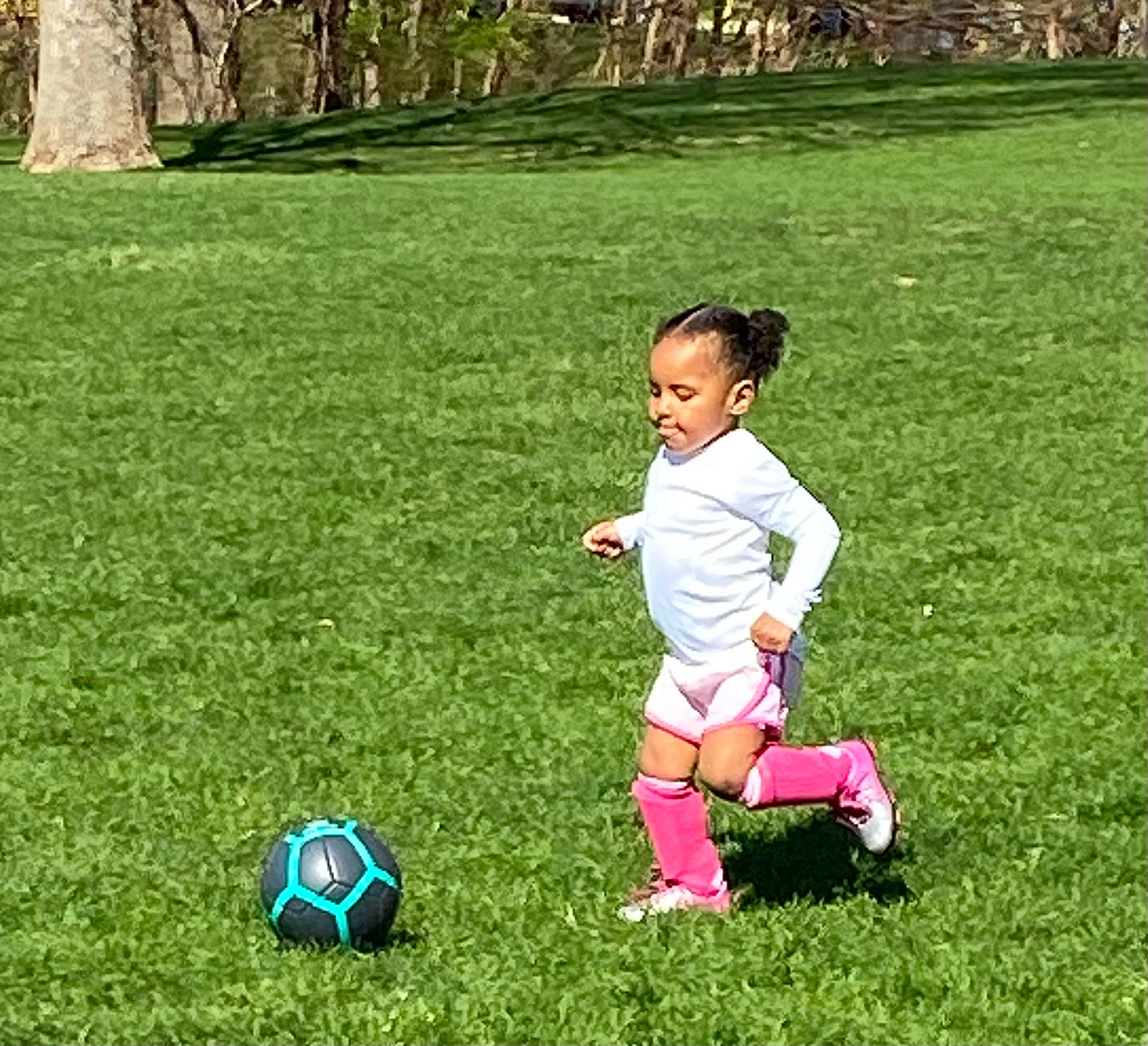 Karsyn joined the competition — help win amazing prizes! ball, ball_game, football, grass, happy, leisure, mammal, natural_environment, nature, people_in_nature, person, plant, player, playing_sports, shoe, shorts, soccer, soccer_ball, sports, sports_equipment