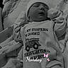 James is registered to the contest to win money with this photo: baby, newborn, sleeping, infant, blanket, clothing, hat, firefighter, text_overlay, black_and_white, cute, cozy, soft, peaceful, lying_down, indoors, person, child, sleep, toddler