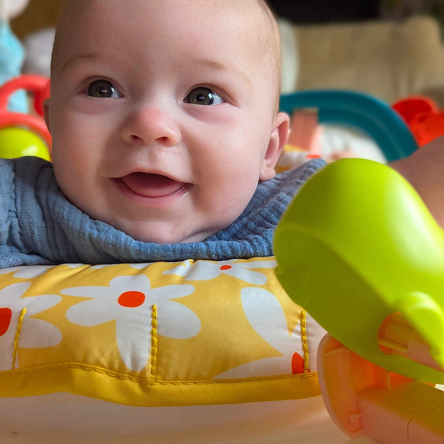 Evelyn joined the competition — help win amazing prizes! baby, bodypart, couch, cushion, face, finger, furniture, hand, happy, head, homedecor, indoors, laughing, newborn, person, photography, portrait, sitting, smile, toy