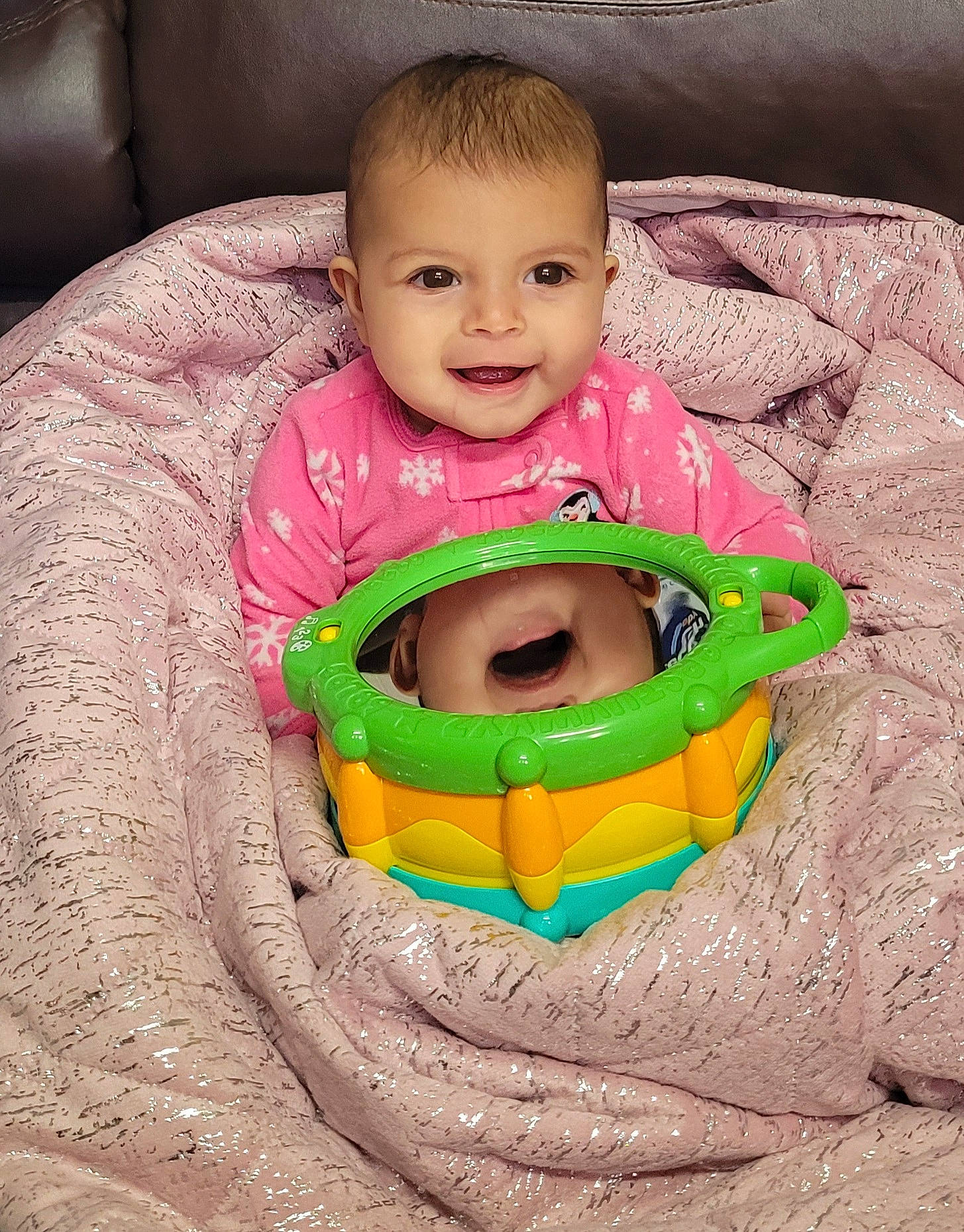 Selina is registered to the contest to win money with this photo: baby, baby_products, baby_toddler_clothing, cheek, child, comfort, couch, eye, face, grass, happy, head, iris, joy, mouth, nose, outerwear, person, skin, sleeve