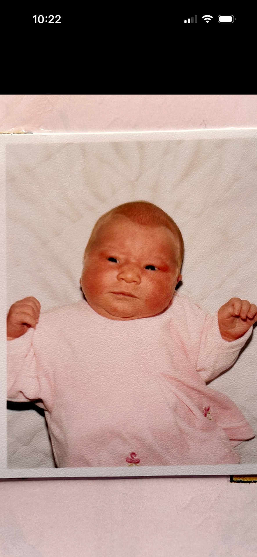 Melody-Rose is registered to the contest to win money with this photo: baby, infant, newborn, pink_clothing, blanket, portrait, face, hands, lying_down, cute, soft_texture, child, young, sleepwear, indoors, skin, expression, small, person, photograph