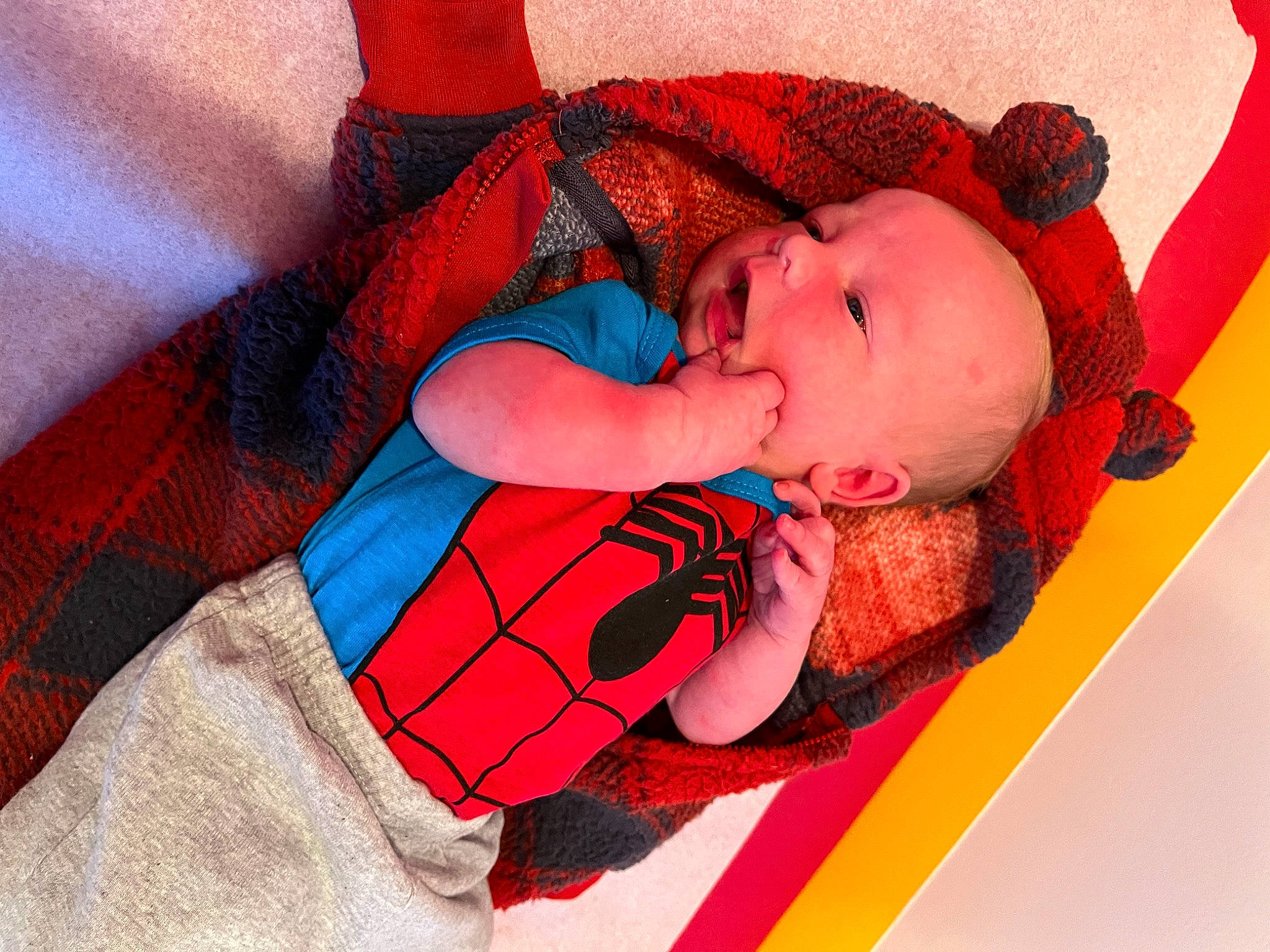 Cyrus is registered to the contest to win money with this photo: arm, baby, baby_products, baby_sleeping, baby_toddler_clothing, bedtime, carmine, child, comfort, electric_blue, eye, human_body, linens, magenta, mouth, nap, pattern, person, room, textile