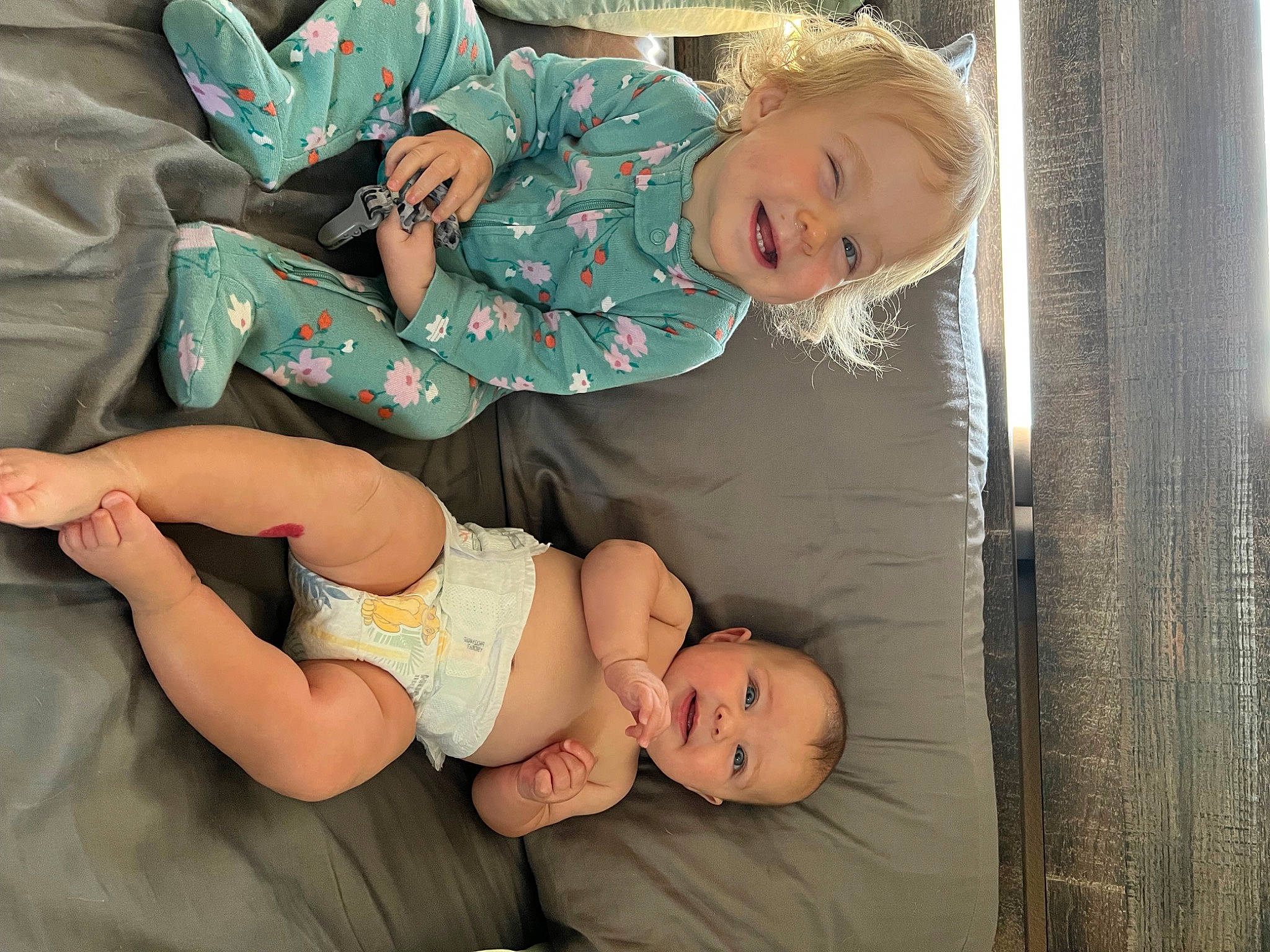 Hallie is registered to the contest to win money with this photo: baby, baby_products, baby_toddler_clothing, cheek, child, comfort, eye, face, head, human_body, joy, leg, organ, person, skin, sleeve, smile, stomach, thigh, toddler