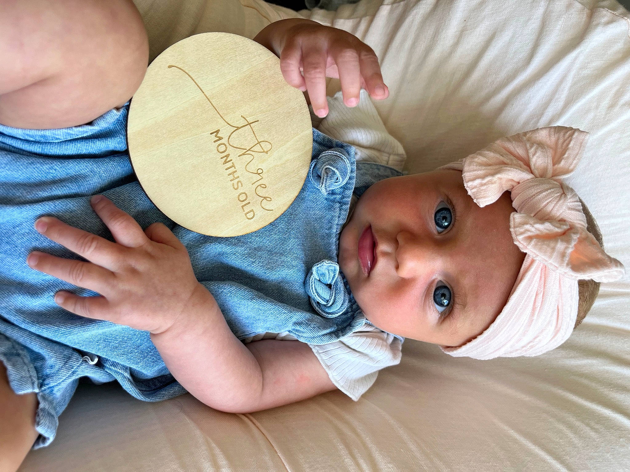 Ivy joined the competition — help win amazing prizes! baby, baby_toddler_clothing, cheek, child, comfort, fashion_accessory, grass, handwriting, happy, hat, headgear, headwear, nail, person, plant, sitting, skin, sun_hat, textile, toddler