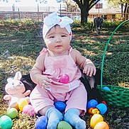 Alayjah is registered to the contest to win money with this photo: baby, child, outdoor, grass, easter_eggs, plush_toy, bunny, headband, pink_clothing, socks, basket, dog, tree, sunlight, nature, toy, spring, holiday, cute, portrait