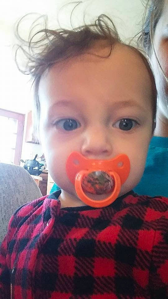 Brantley is registered to the contest to win money with this photo: baby, cheek, child, eating, eye, face, food, head, lip, mouth, nose, person, selfie, smile, toddler