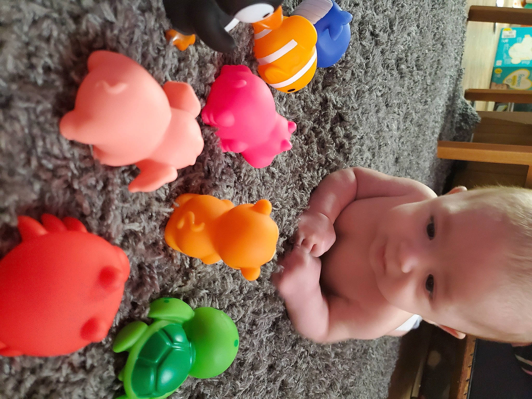 Joey joined the competition — help win amazing prizes! art, baby_playing_with_toys, blue, fun, gesture, happy, orange, organism, party_supply, person, petal, plastic, play, product, red, sweetness, table, thumb, toddler, toy