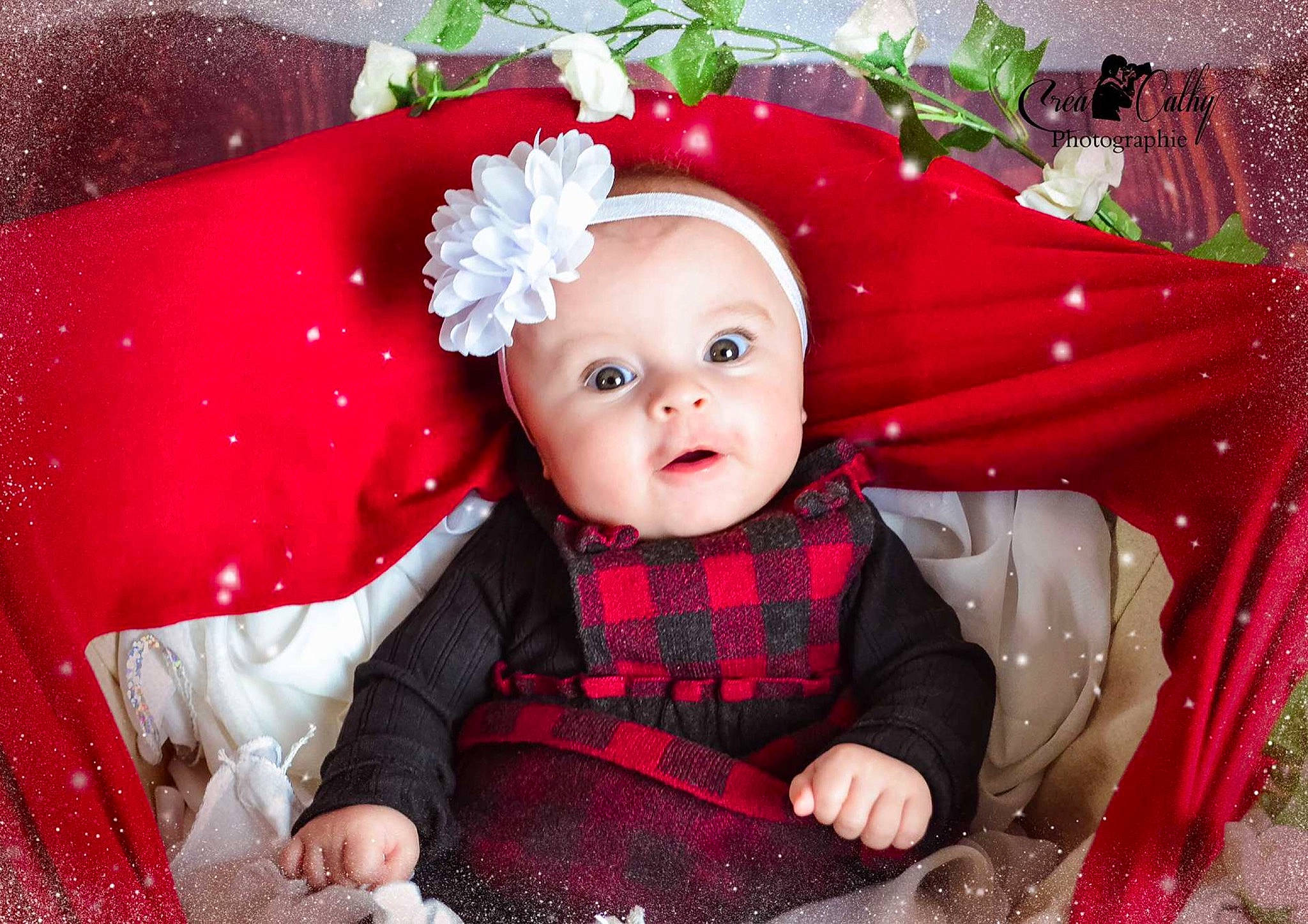 Tessa a rejoint le concours — aidez-le/la à gagner de superbes lots ! baby, baby_toddler_clothing, child, costume_hat, doll, dress, event, fashion_accessory, happy, headwear, holiday, magenta, pattern, person, pink, product, red, sitting, sleeve, textile