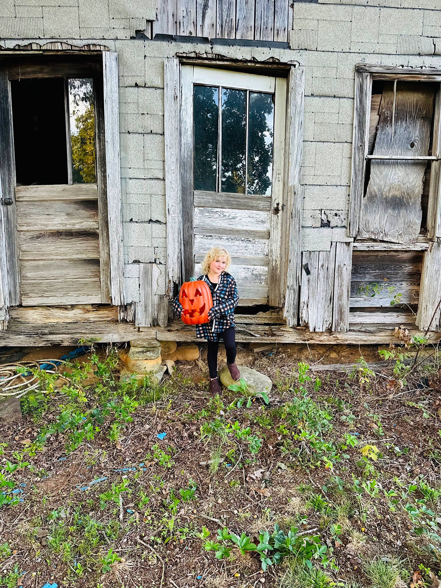Aerobella is registered to the contest to win money with this photo: brick, building, cottage, door, facade, grass, house, joy, leaf, people_in_nature, person, plant, property, roof, rural_area, siding, tints_and_shades, toddler, tree, wall