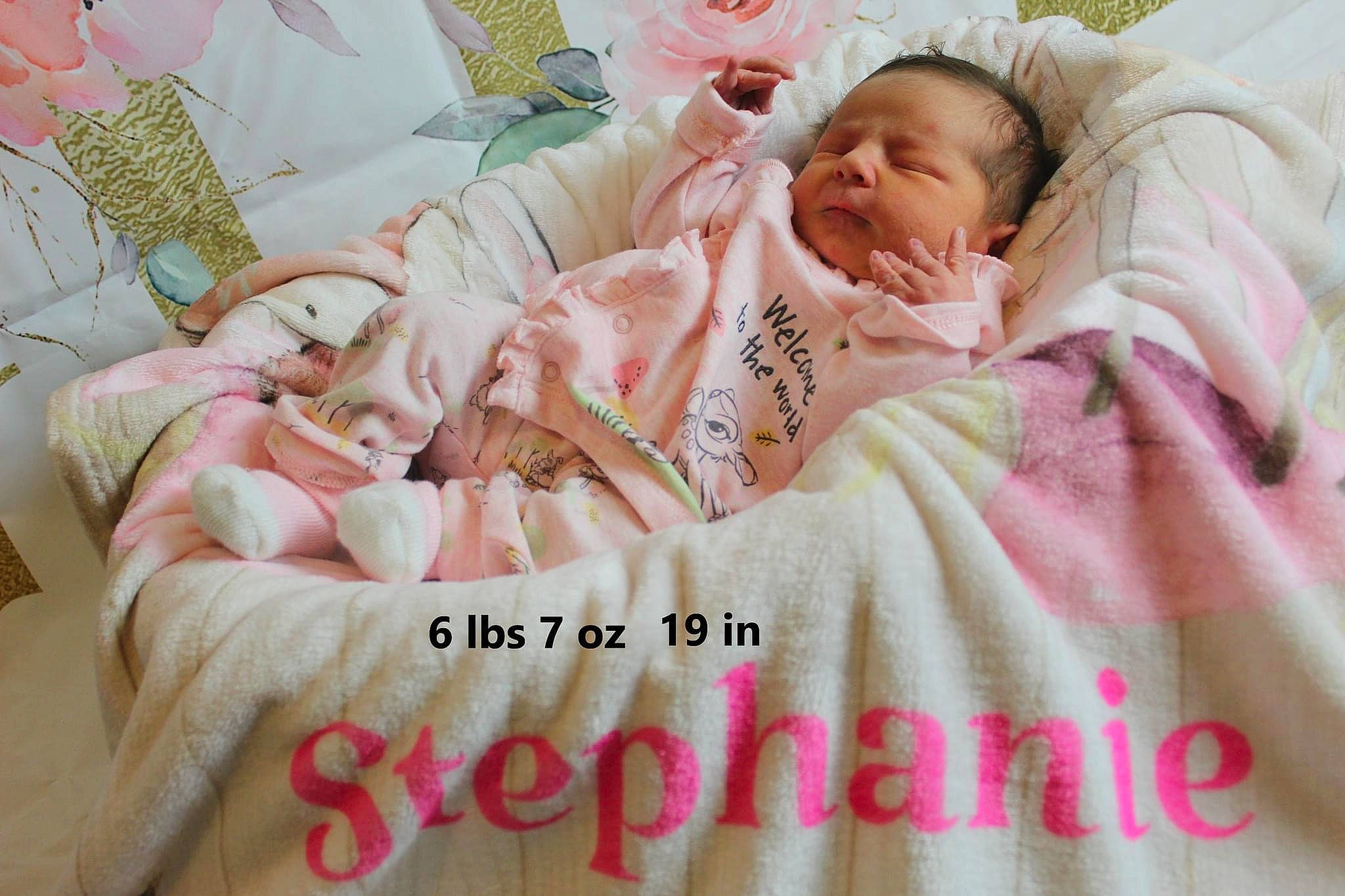 Stephanie is registered to the contest to win money with this photo: baby, baby_products, baby_sleeping, baby_toddler_clothing, bed, bedding, bedtime, child, comfort, event, fur, happy, linens, peach, person, pink, room, skin, sleeve, textile