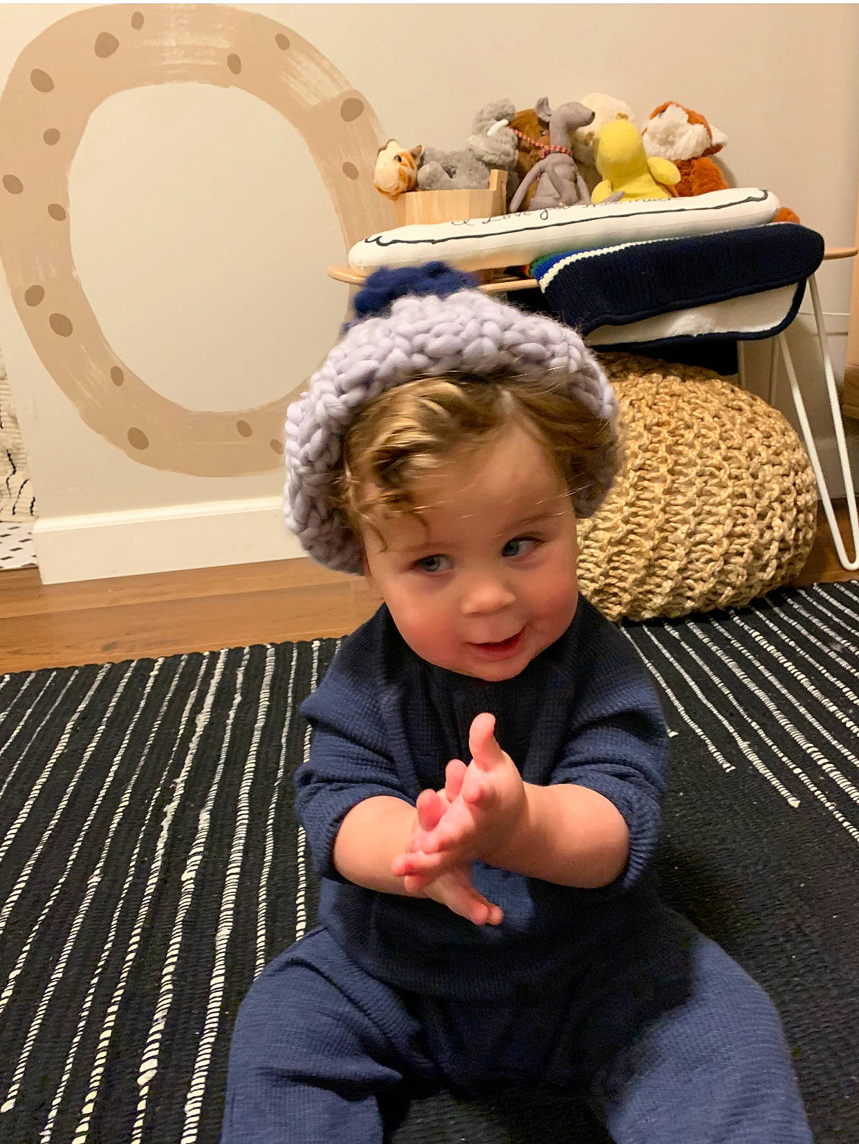 Cruz is registered to the contest to win money with this photo: baby, baby_toddler_clothing, comfort, foot, home_accessories, lap, living_room, person, sitting, toddler, wicker