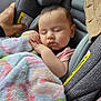Rosalie is registered to the contest to win money with this photo: baby, sleeping, car_seat, blanket, hand, child, infant, interior, car, window, seat, comfort, travel, peaceful, soft, clothing, safety, resting, cute, portrait
