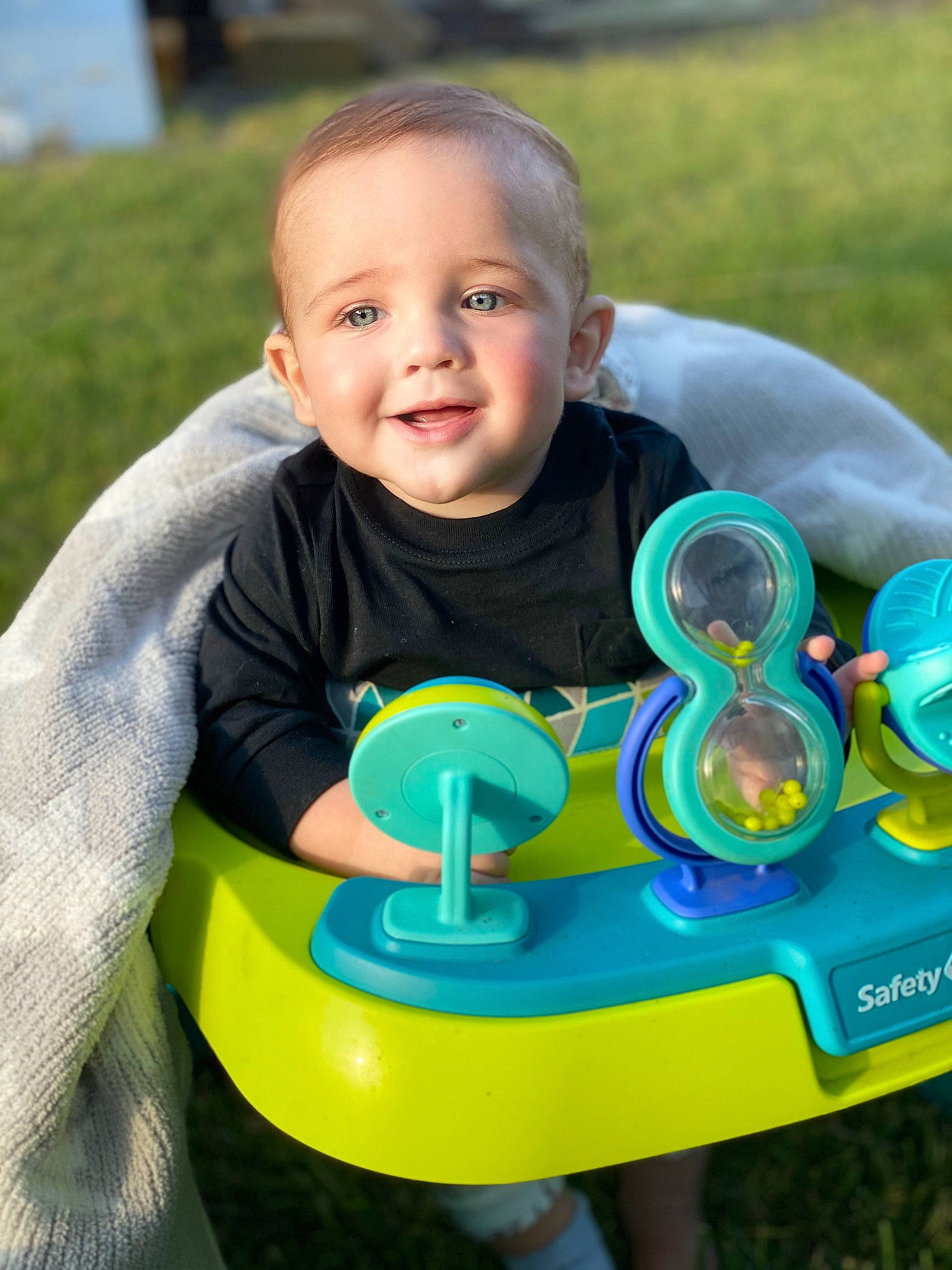 Brayen is registered to the contest to win money with this photo: baby, baby_playing_with_toys, baby_products, baby_toys, child, fun, grass, green, person, play, smile, toddler