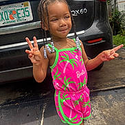 Kaylani is registered to the contest to win money with this photo: child, girl, braided_hair, beads, peace_sign, pink_outfit, barbie, boots, car, infiniti, license_plate, outdoor, driveway, concrete, brick, smiling, summer, fashion, cute, playful