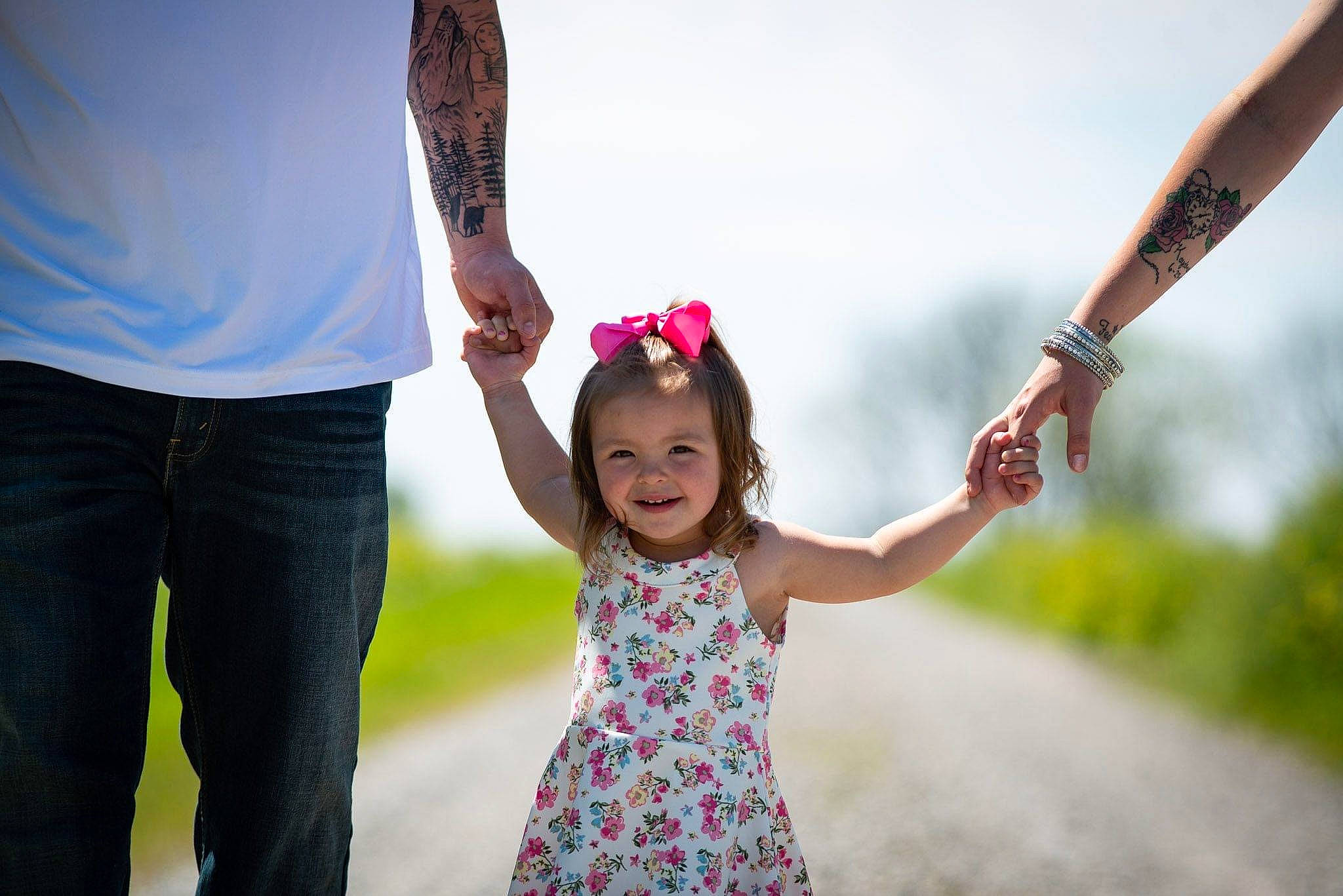 Kaydence is registered to the contest to win money with this photo: child, dress, facial_expression, family, fun, gesture, hair_accessory, happy, joy, people, person, photo_shoot, photograph, photography, pink, plant, smile, snapshot, spring, toddler
