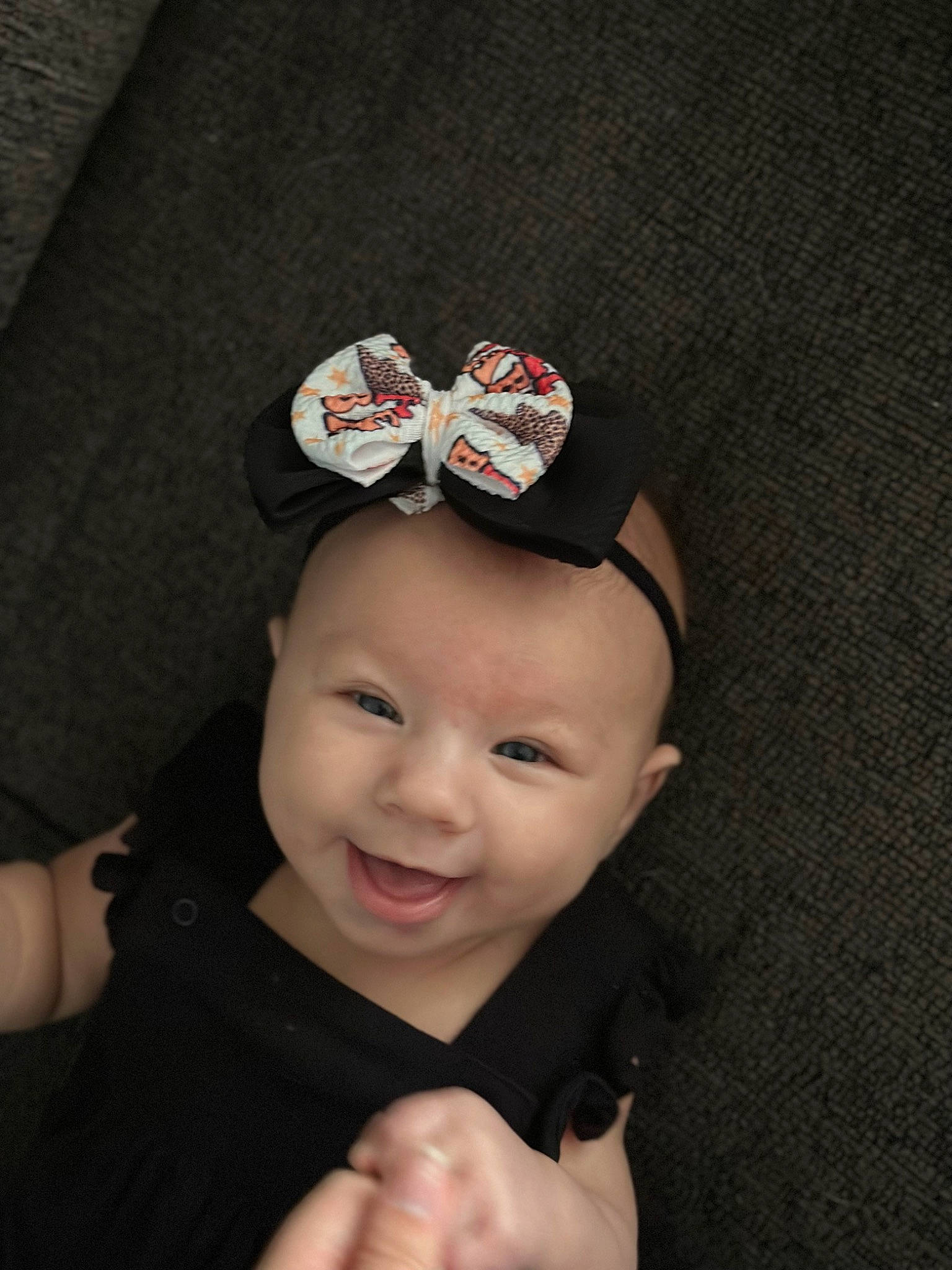 Madyson is registered to the contest to win money with this photo: baby, baby_laughing, baby_toddler_clothing, beanie, cap, carmine, child, costume_hat, fashion_accessory, finger, flash_photography, gesture, hair_accessory, happy, hat, headband, headpiece, magenta, person, smile